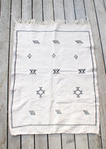 TAPIS MOTIFS BERBÈRES NOIR ET ÉCRU